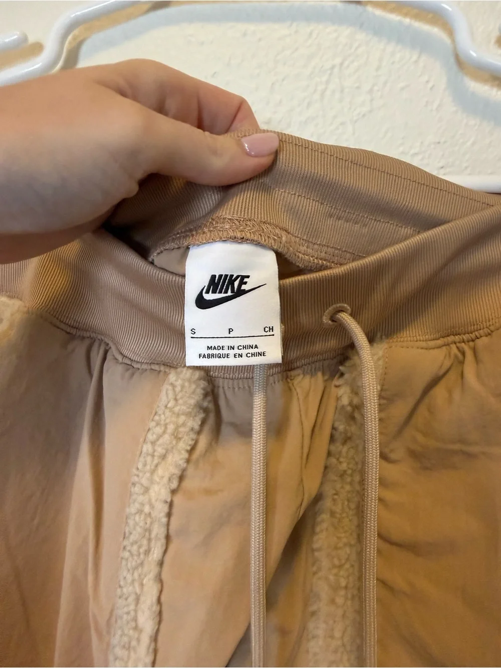Nike Beige Track Pants with White Swoosh